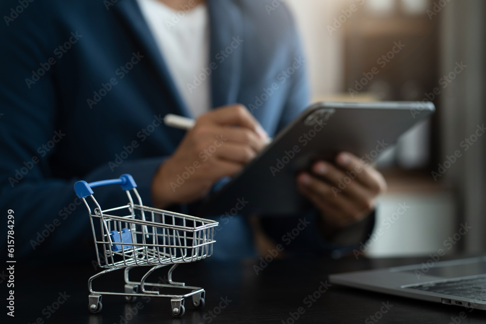 online shopping concept, Male shopping online is a form of electronic commerce from a seller over internet. online shopping concept, Male shopping online is a form of electronic commerce from a seller over internet.