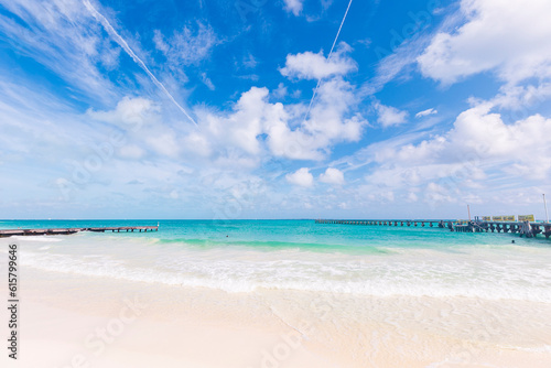Fototapeta Naklejka Na Ścianę i Meble -  Cancun Mexico beautiful caribbean sea on a sunny day and cloudy sky. Exotic Paradise. Travel, Tourism and Vacations Concept. Tropical Resort.