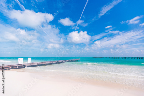 Fototapeta Naklejka Na Ścianę i Meble -  Cancun Mexico beautiful caribbean sea on a sunny day and cloudy sky. Exotic Paradise. Travel, Tourism and Vacations Concept. Tropical Resort.