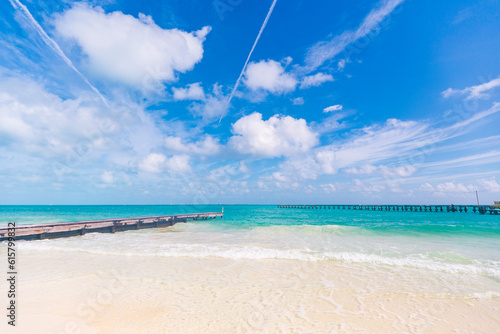 Cancun Mexico beautiful caribbean sea on a sunny day and cloudy sky. Exotic Paradise. Travel  Tourism and Vacations Concept. Tropical Resort.