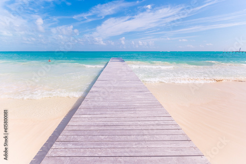 Cancun Mexico beautiful caribbean sea on a sunny day and cloudy sky. Exotic Paradise. Travel  Tourism and Vacations Concept. Tropical Resort.