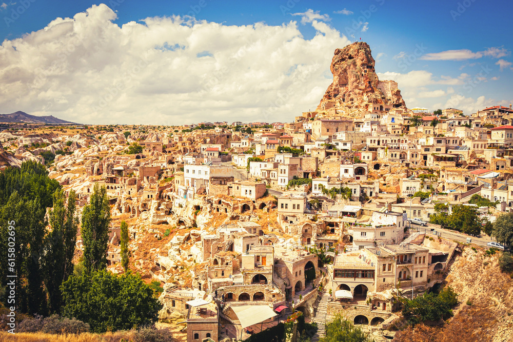 Ortahisar fortress in Cappadocia, popular tourist destination, front view with dynamic sky cloudscape static timelapse