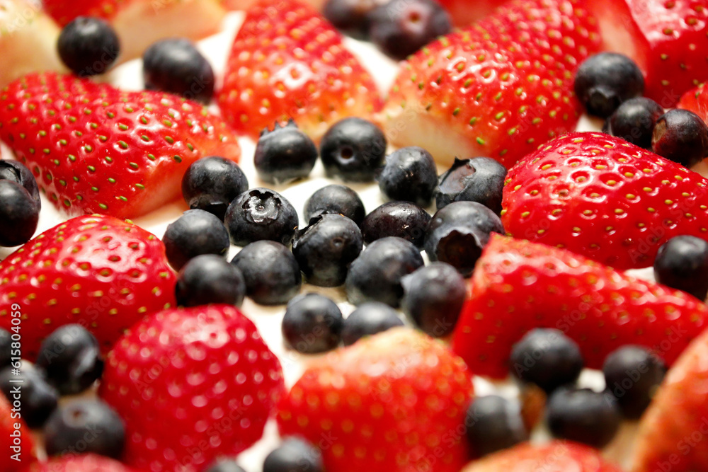 Round cream cake with berries, blueberries, strawberries, top view close up background. Round cream cake with berries, blueberries, strawberries, top view close up background.