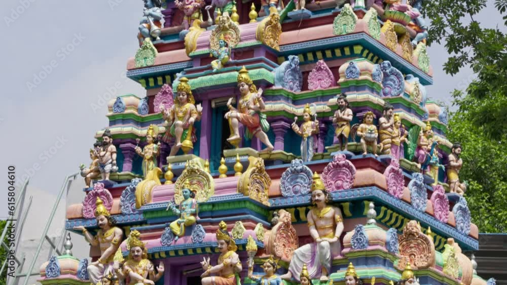 The Indian Hindu temple features a Shikhara adorned with sculptures of gods The Indian Hindu temple features a Shikhara adorned with sculptures of gods
