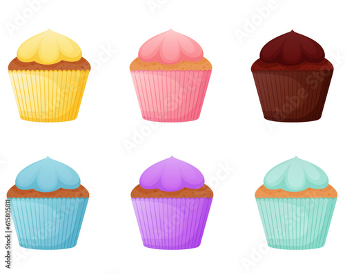 Colorful cupcakes decorated with whipped cream.