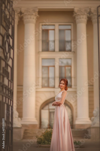 Beautiful slender girl in an evening dress. Prom. Graduate. Schoolgirl. Student. Girl with long red hair. Portrait of a girl. Girl dancing. Tenderness. Fashionable girl. © Taniya Larina