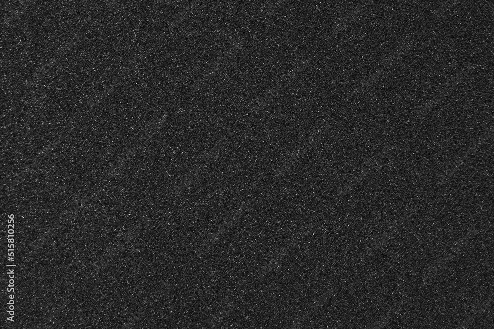 Background filled with black particles. Background filled with black particles.