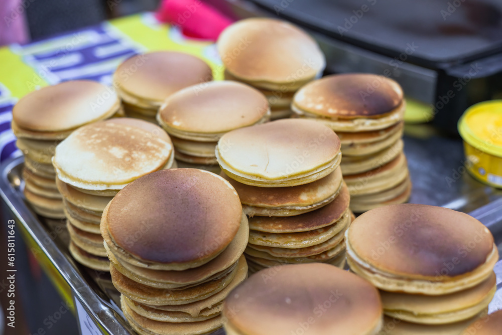 A lot of cooked pancakes without filling in vietnamese night market A lot of cooked pancakes without filling in vietnamese night market