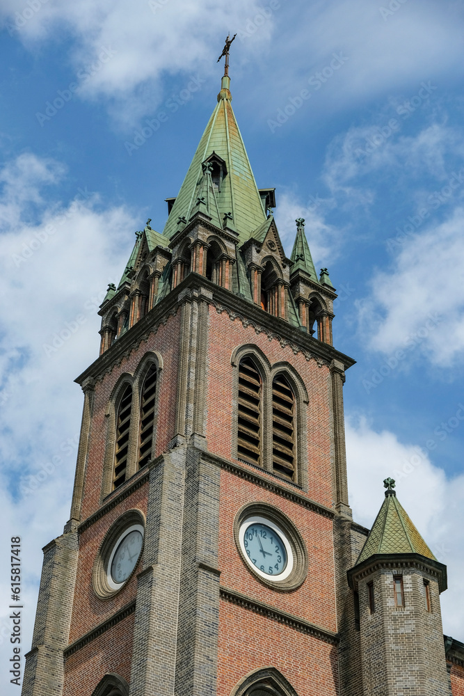 Seoul, South Korea - June 22, 2023: Myeongdong Cathedral is the community of the Roman Catholic Church in Seoul, South Korea. Seoul, South Korea - June 22, 2023: Myeongdong Cathedral is the community of the Roman Catholic Church in Seoul, South Korea.