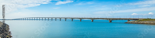 Panoramic view of the Ile de Ré bridge seen from La Rochelle shore on a sunny day in Charente-Maritime, France