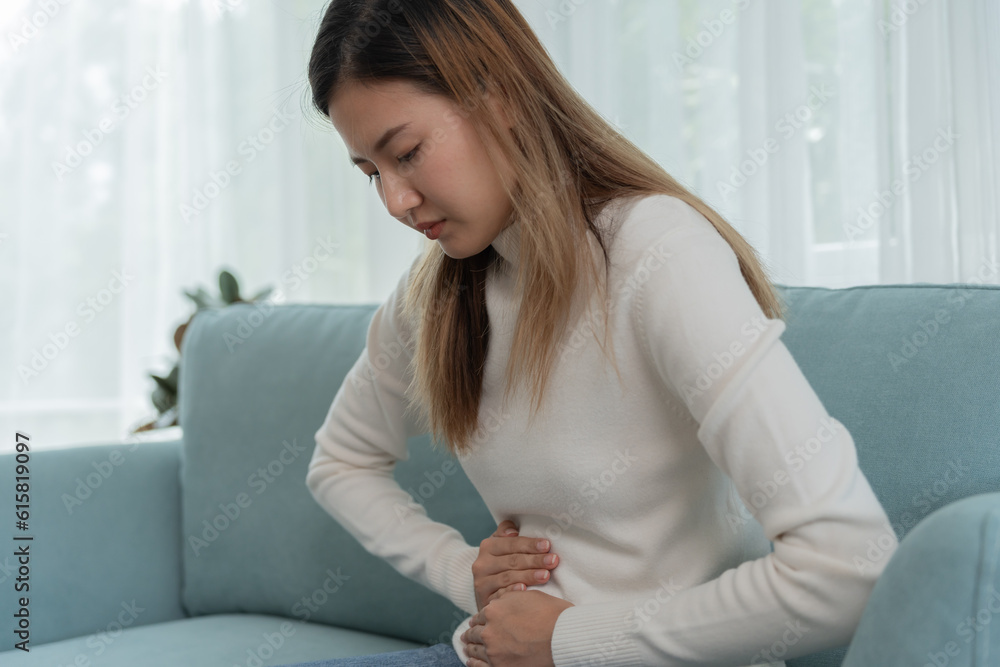 stomach ache. Asian women have abdominal pain, indigestion, gastritis, menstrual cramps, flatulence, diarrhea, distention, colon cancer, belly inflammation problem, suffer food poisoning, abdomen stomach ache. Asian women have abdominal pain, indigestion, gastritis, menstrual cramps, flatulence, diarrhea, distention, colon cancer, belly inflammation problem, suffer food poisoning, abdomen