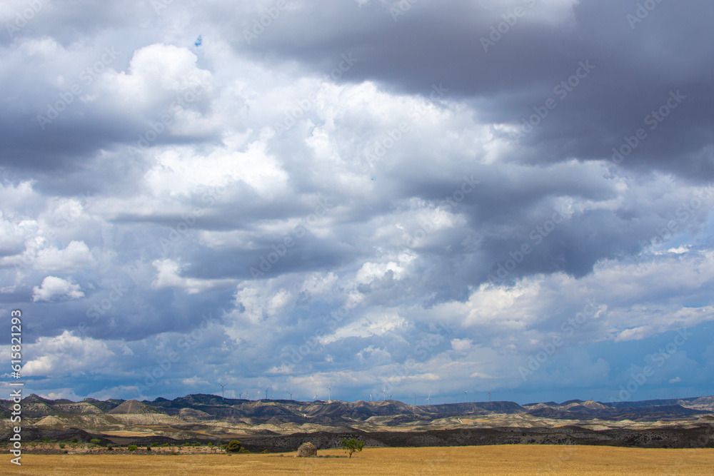 Idyllic scenery with a cloudy sky in the mountain range of Alcubierre
