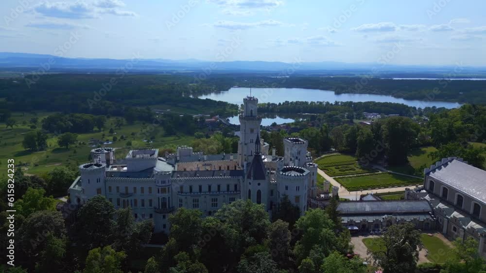 white Fairy tale Castle in Czech Republic. Fabulous aerial top view flight drone white Fairy tale Castle in Czech Republic. Fabulous aerial top view flight drone