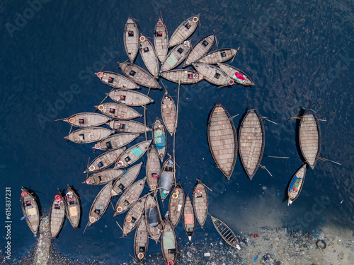 Aerial view of Wooden passenger boats along the Buriganga River, Sadarghat, Dhaka, Bangladesh photo
