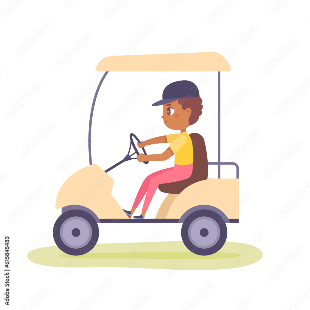 Young golfer driving golf cart, kid player sitting behind wheel of electric car to drive