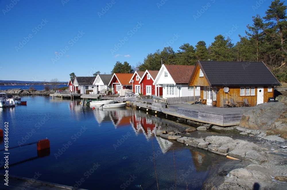 Traditional Norwegian Wooden Houses overlooking the water. 
