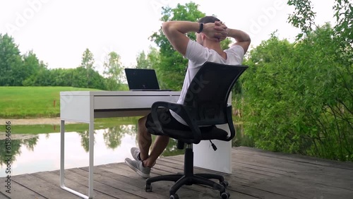 Remote work in the lap of nature, as a freelancer sets up their office equipment amidst scenic surroundings