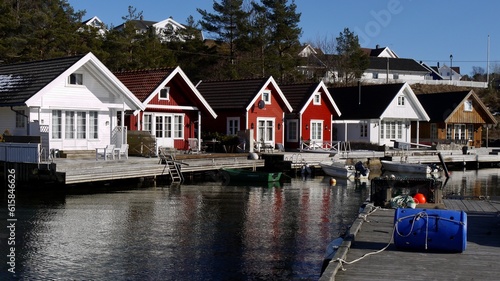 Traditional Norwegian Wooden Houses overlooking the water. 