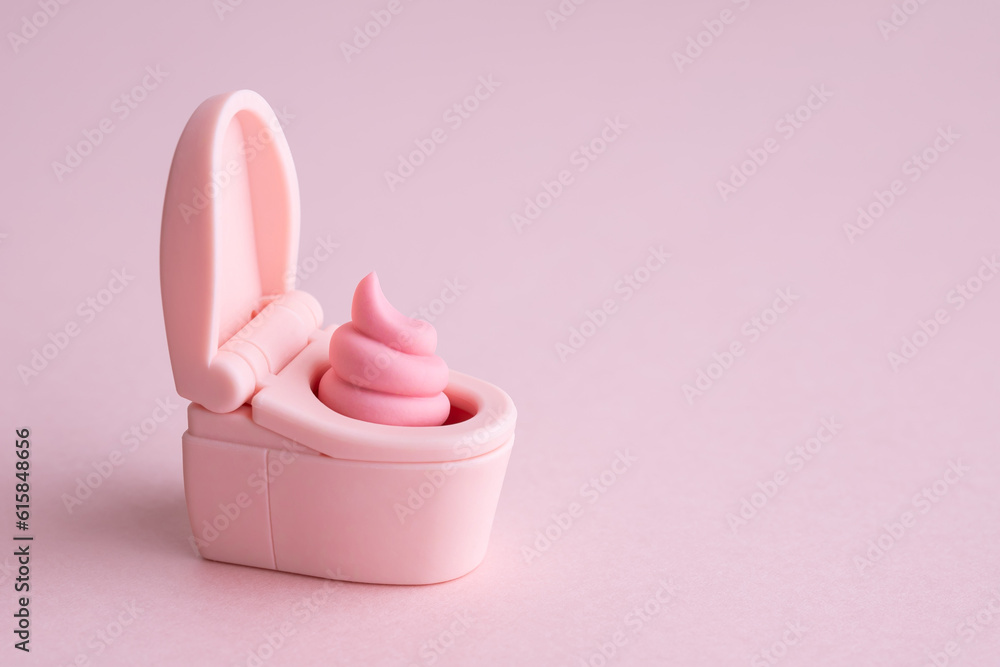 ピンクのウンチとトイレの便器 ピンクのウンチとトイレの便器
