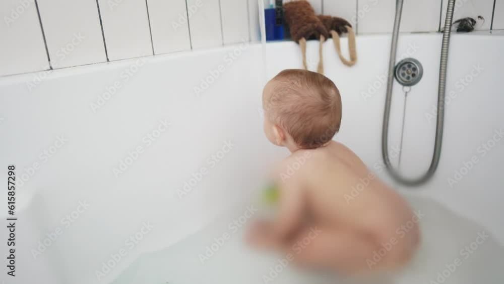two baby bathe in the bath. happy family kid dream concept. baby wash