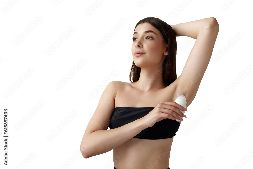 Portrait of beautiful young woman with well-kept skin using deodorant stick for freshness against white studio background. Concept of natural female beauty, body and skincare, cosmetology, health, ad Portrait of beautiful young woman with well-kept skin using deodorant stick for freshness against white studio background. Concept of natural female beauty, body and skincare, cosmetology, health, ad
