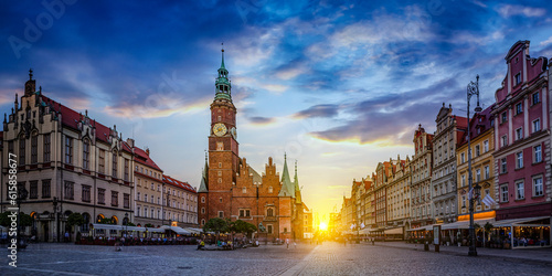 Wroclaw central market square with old houses and sunset. Panoramic evening view, long exposure, timelapse. Historical capital of Silesia, Wroclaw (Breslau) , Poland, Europe.