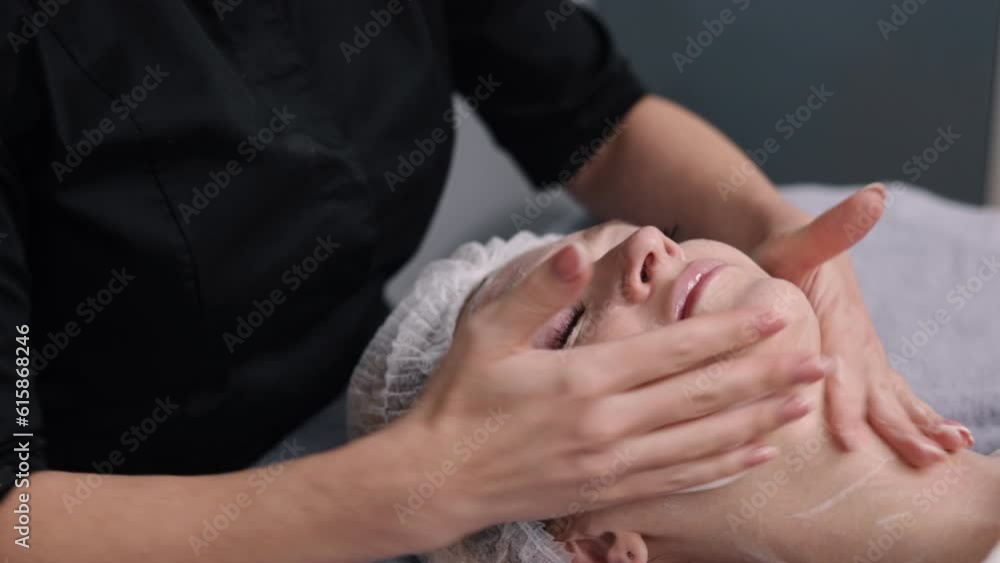 peeling procedure, enzyme mask, Cosmetology therapy. In modern cosmetology, facial brush peel is used to apply retinol to face. Beauty woman is peeling in order to improve her appearance. peeling procedure, enzyme mask, Cosmetology therapy. In modern cosmetology, facial brush peel is used to apply retinol to face. Beauty woman is peeling in order to improve her appearance.