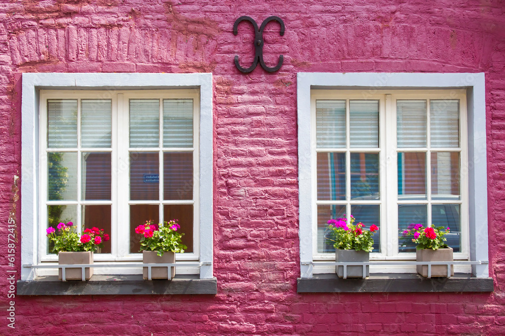 pink house with windows with flowers, Wachtendonk