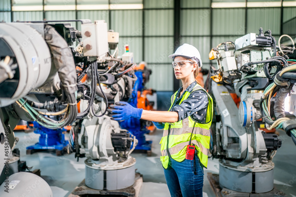 Technology Engineer Working in Factory. Holding check-list and supervising Technology Engineer Working in Factory. Holding check-list and supervising