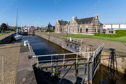 historic Lemstersluis, a drop lock in Lemmer, Netherlands photo