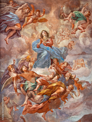 NAPLES, ITALY - APRIL 20, 2023: The detail of fresco of Assumption in church Basilica di Santa Maria degli Angeli a Pizzofalcone by Giovan Battista Beinaschi (1668-1675).