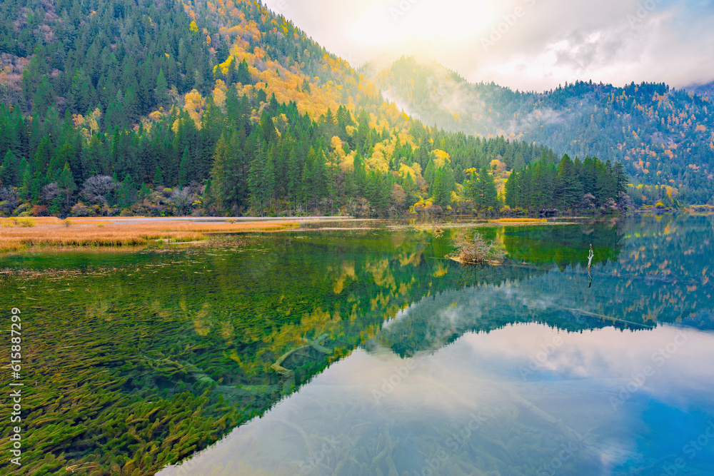 Autumn view of the lake with pure water at early morning time. (Jiuzhaigou nature reserve) Jiuzhai Valley National Park, China