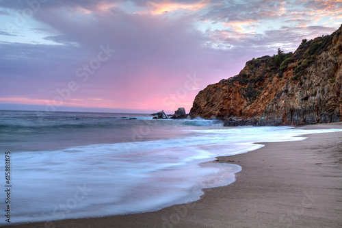 Sunset over the beach at Crescent Bay in Laguna Beach, California, USA in summer
