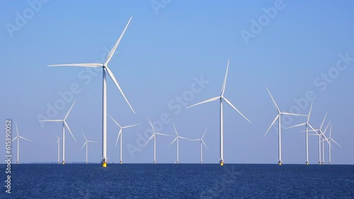 Offshore wind farm with many windmills in the Netherlands 