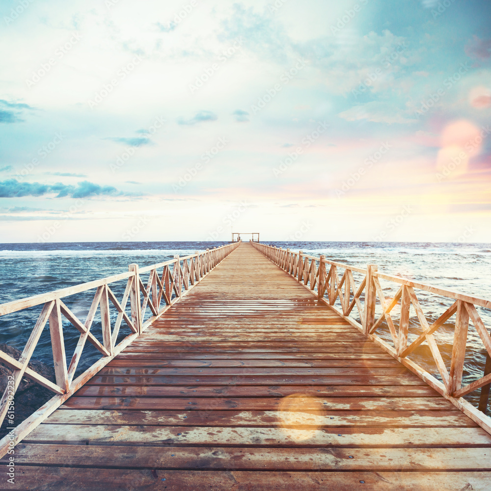 Pier on the sea at sunset. Freedom and relax concept