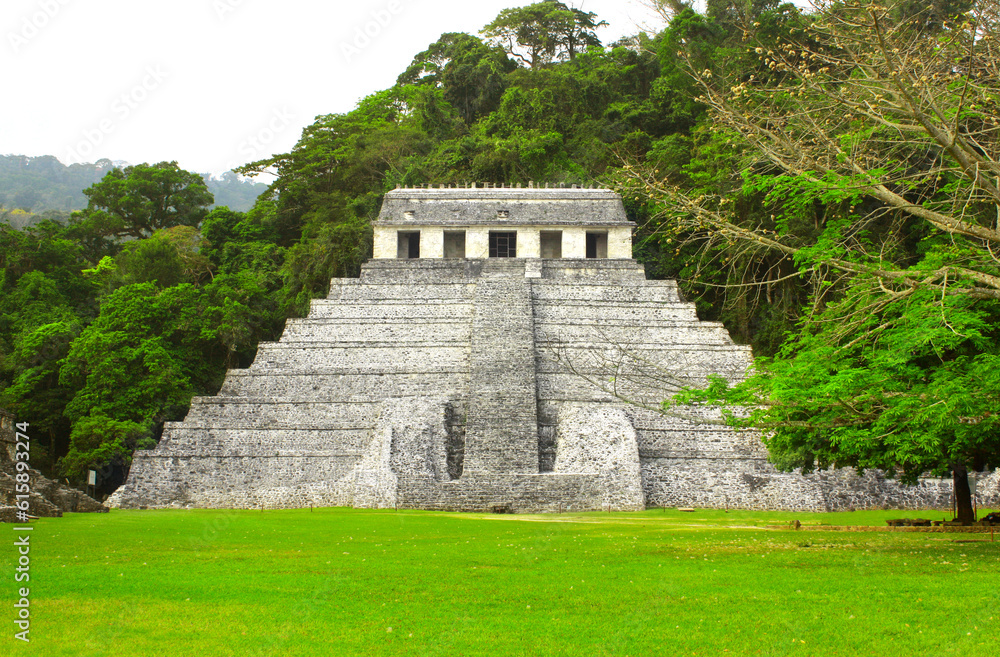 Temple of the Inscriptions - mesoamerican stepped pyramid structure at the pre-Columbian Maya civilization, Palenque, Chiapas, Mexico. UNESCO world heritage site Temple of the Inscriptions - mesoamerican stepped pyramid structure at the pre-Columbian Maya civilization, Palenque, Chiapas, Mexico. UNESCO world heritage site
