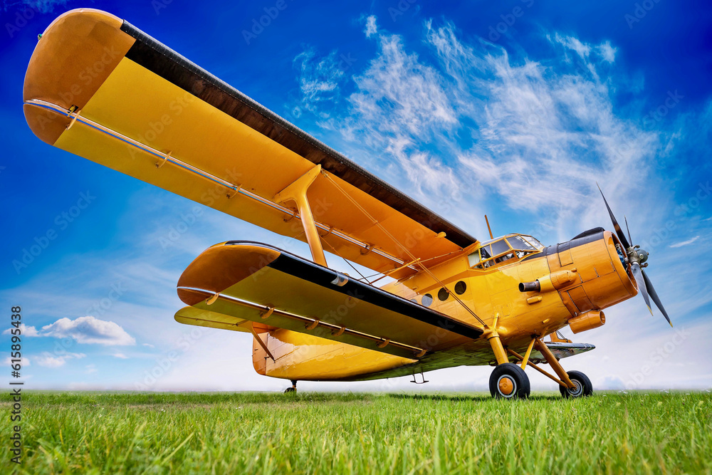 historic biplane against a cloudy sky historic biplane against a cloudy sky