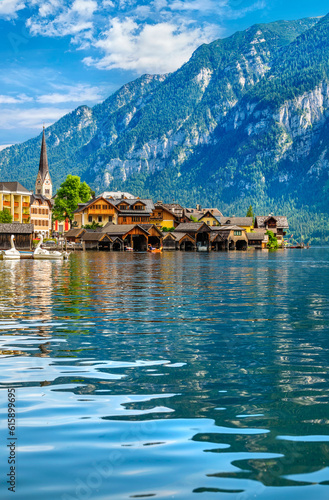 Chapel in Hallstatt old town famous landmark Austria on lake Hallstattersee among Austrian Alps mountains with green forests.