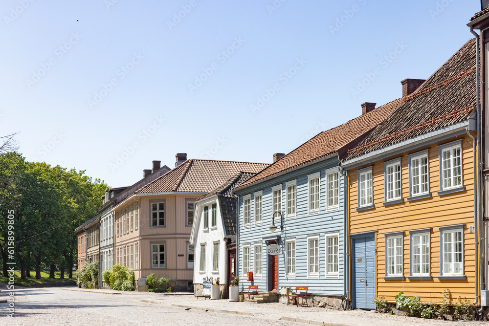 Happy walking in old Fredrikstad on a great warm summer day, with many old buildings, Norway Happy walking in old Fredrikstad on a great warm summer day, with many old buildings, Norway