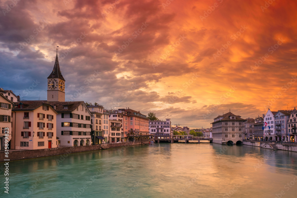 Cityscape image of Zurich, Switzerland during dramatic sunset.