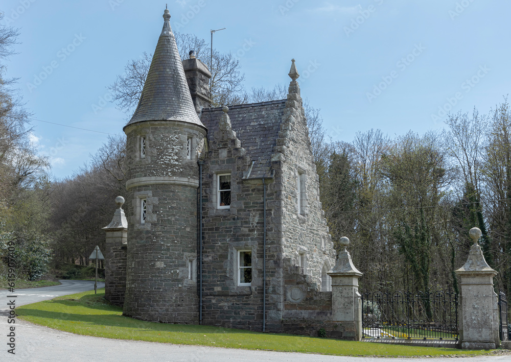 Scottish gatehouse with turret made of grey stone
