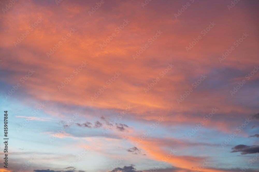 Beautiful bright summer sunset sky with clouds. Nature sky  background.