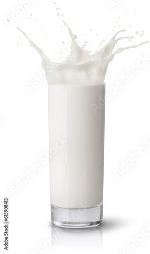 Milk splashing from glass isolated on white background