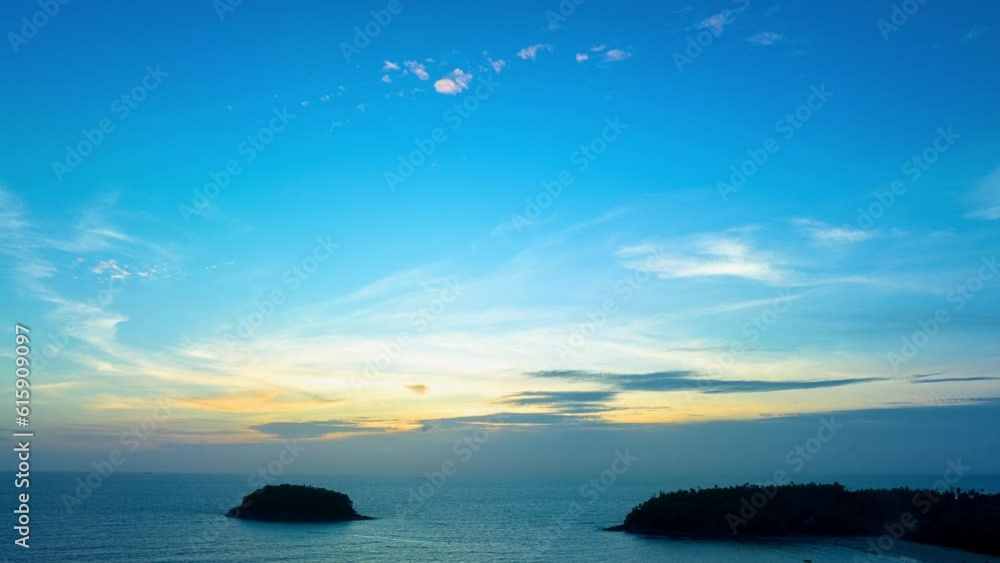 Aerial hyperlapse view beautiful blue sky at sunset above the ocean..Scene of colorful blue rays glistened at sunset..creating a beautiful and calming sight..Gradient color abstract nature background. Aerial hyperlapse view beautiful blue sky at sunset above the ocean..Scene of colorful blue rays glistened at sunset..creating a beautiful and calming sight..Gradient color abstract nature background.