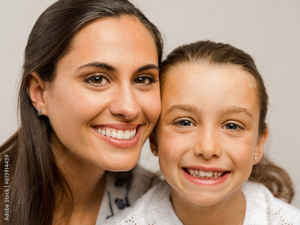 Shot of a beautiful Mother and Daughter smiling Shot of a beautiful Mother and Daughter smiling