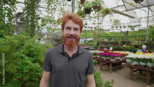 Happy Customer Portrait, Caucasian Redhead Male in 30s, Standing Inside Flower Shop - Looking at Camera in Horticulture Place