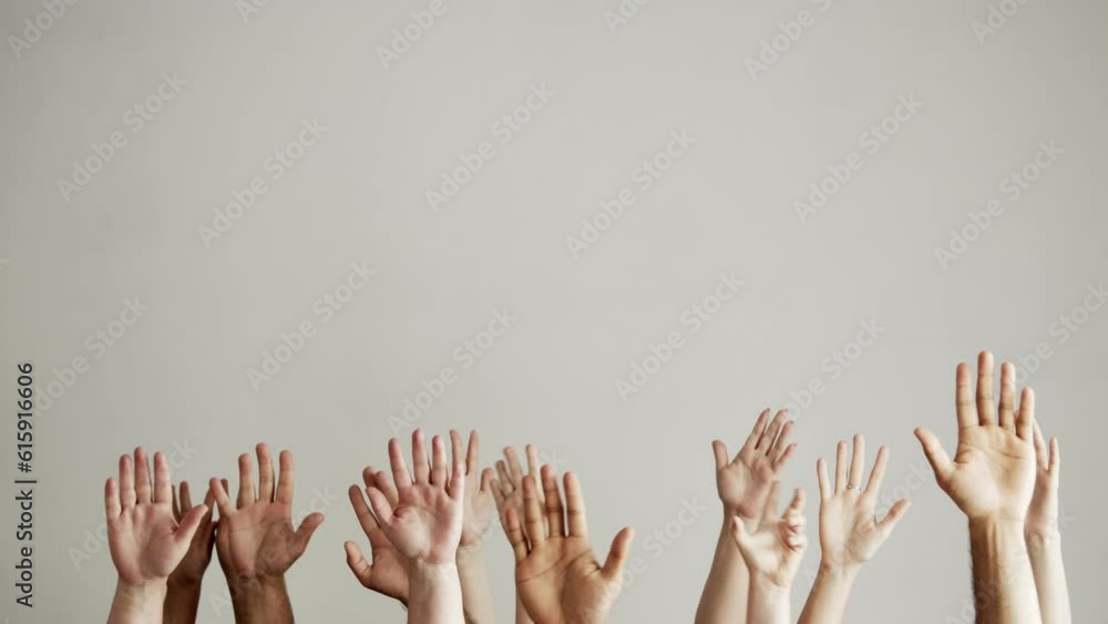 Many male and female hands of different colors and sizes on a white background are raised forward with their palms up. Forest of hands. Volunteers Many male and female hands of different colors and sizes on a white background are raised forward with their palms up. Forest of hands. Volunteers