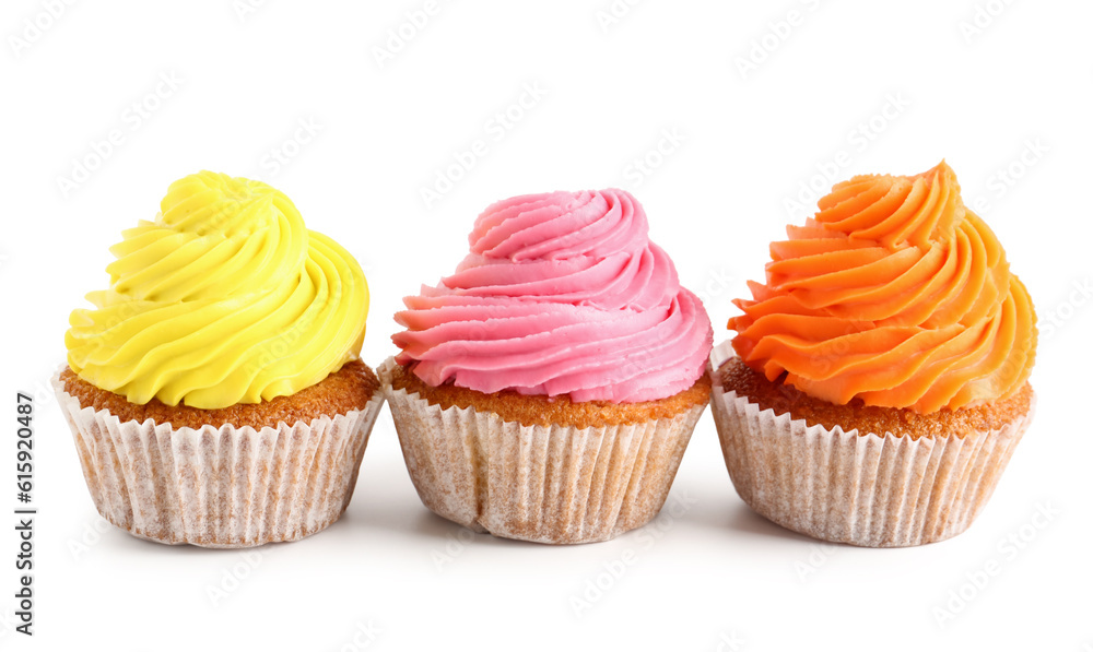 Tasty colorful cupcakes on white background