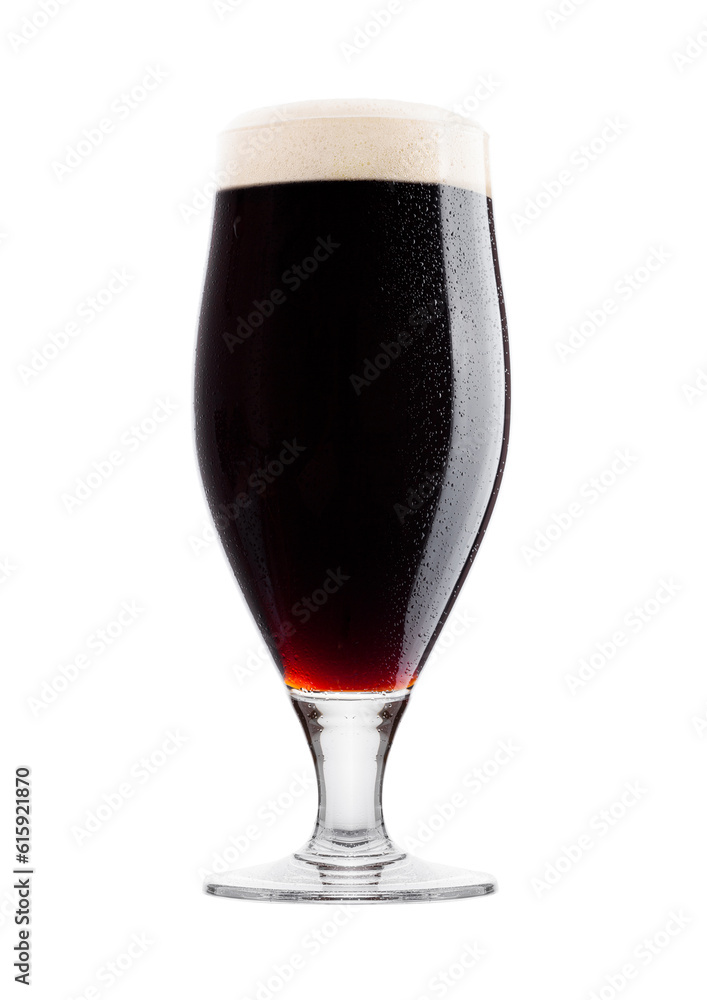 Cold glass of dark beer with foam and dew on white background with reflection Cold glass of dark beer with foam and dew on white background with reflection
