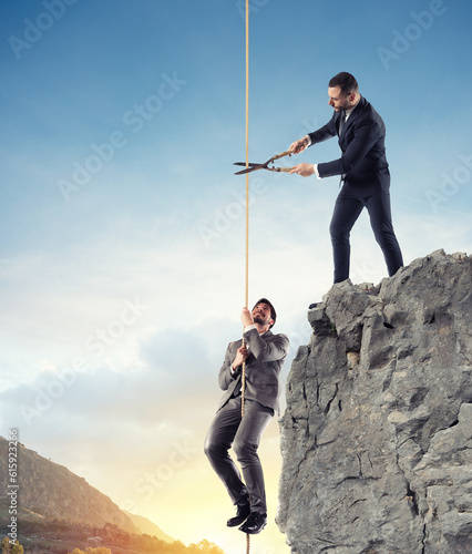 Obraz na plátně Businessman who doesn't help a competitor to reach the success
